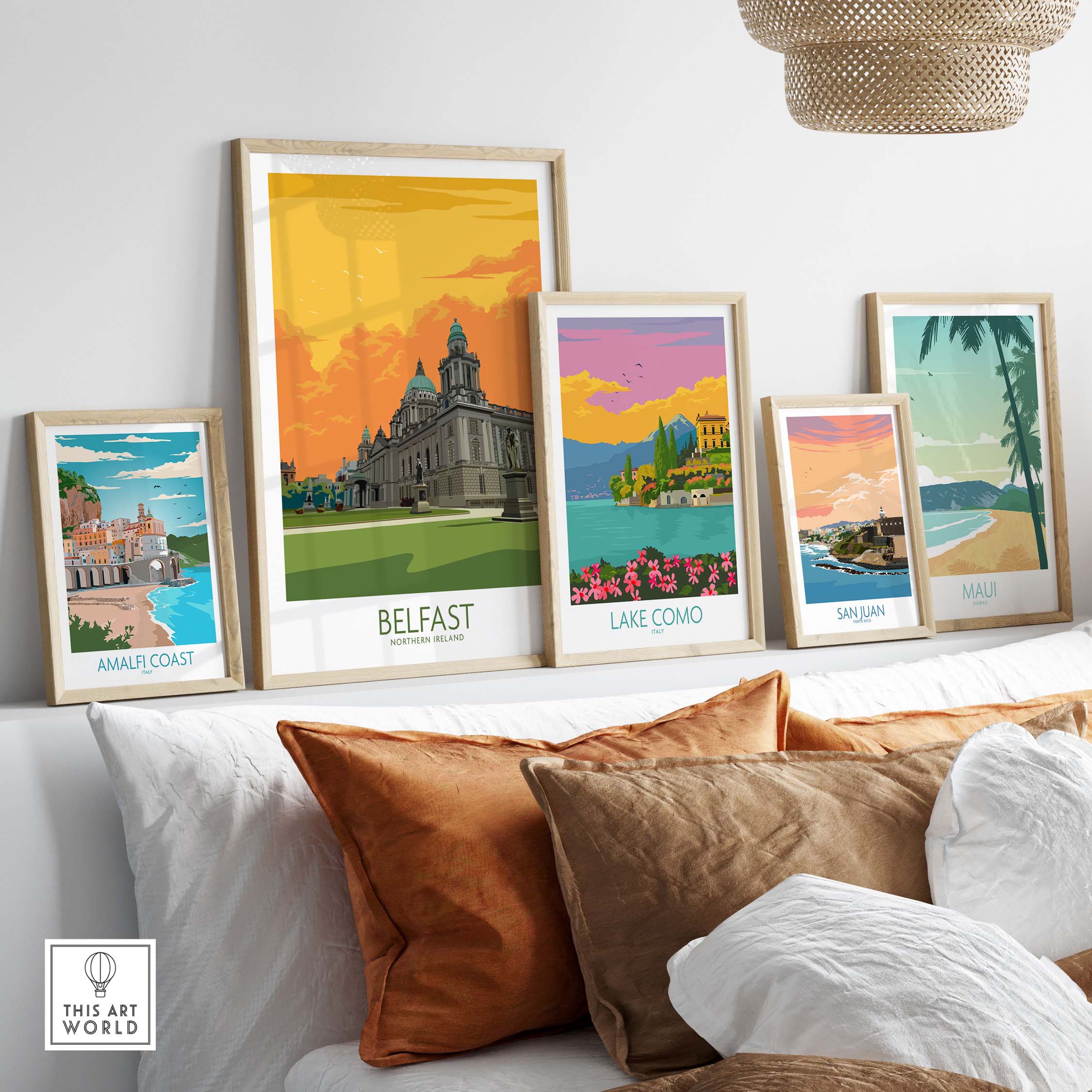 Framed Belfast travel poster among other vintage-inspired travel prints on a stylish wall, enhancing home decor.