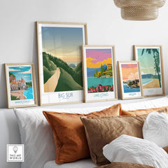Framed Big Sur California art print and other travel art prints on a stylish wall display.