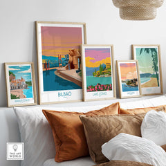 Framed Bilbao and other travel posters on a stylish wall, showcasing minimalist vintage art from Spain and Italy.