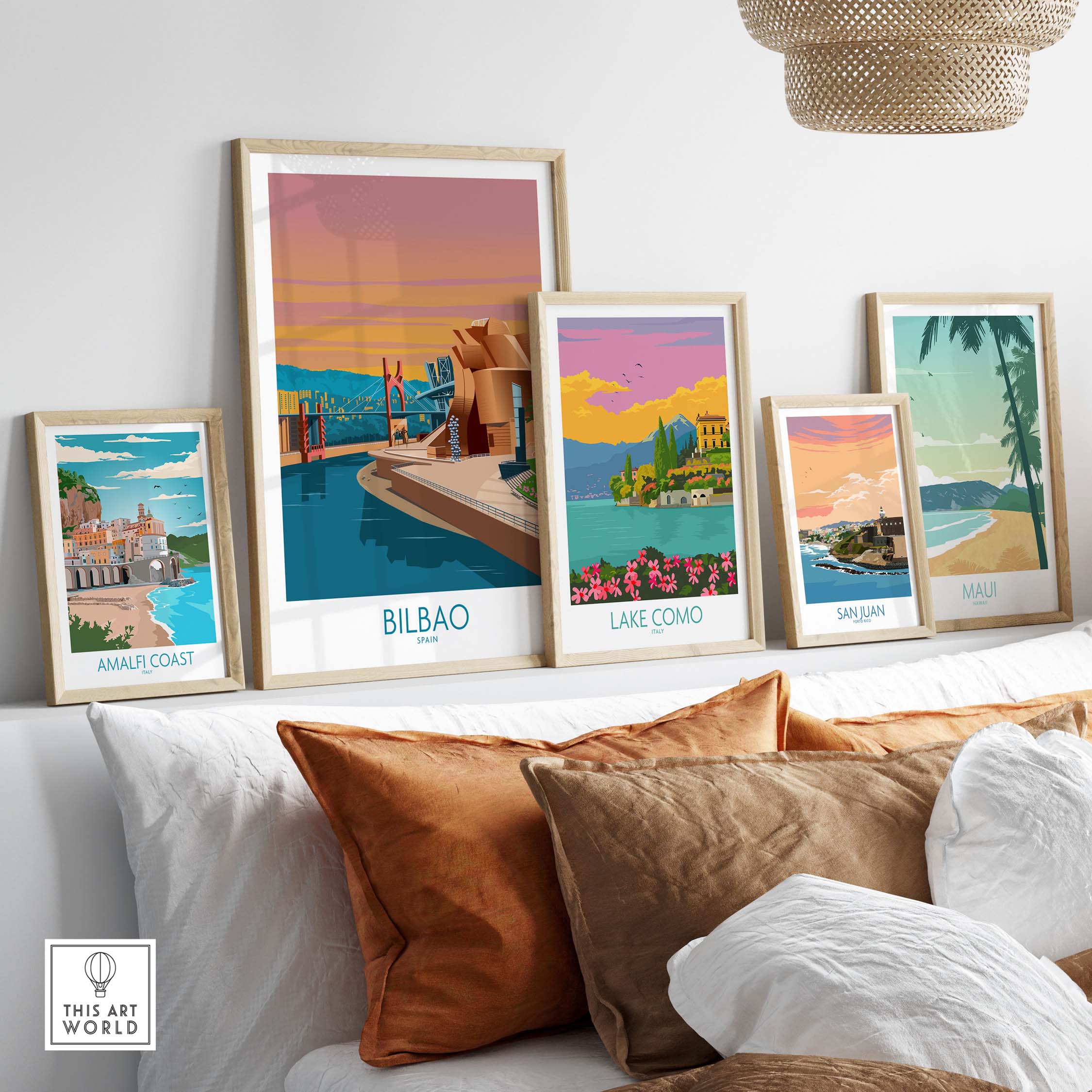 Framed Bilbao and other travel posters on a stylish wall, showcasing minimalist vintage art from Spain and Italy.