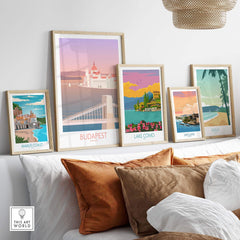 Stylish framed Budapest travel print among vintage posters, showcasing art for home or office decor.
