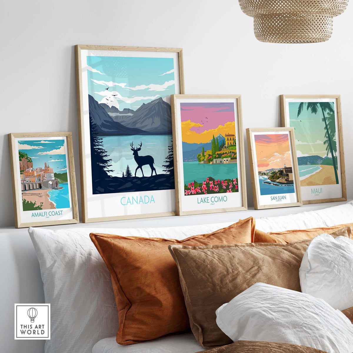 Stylish travel poster prints featuring Canada, Lake Como, and more, displayed on a cozy living room wall.