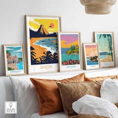 Colorful Cancun travel poster print displayed alongside other vintage travel art in a stylish home setting.
