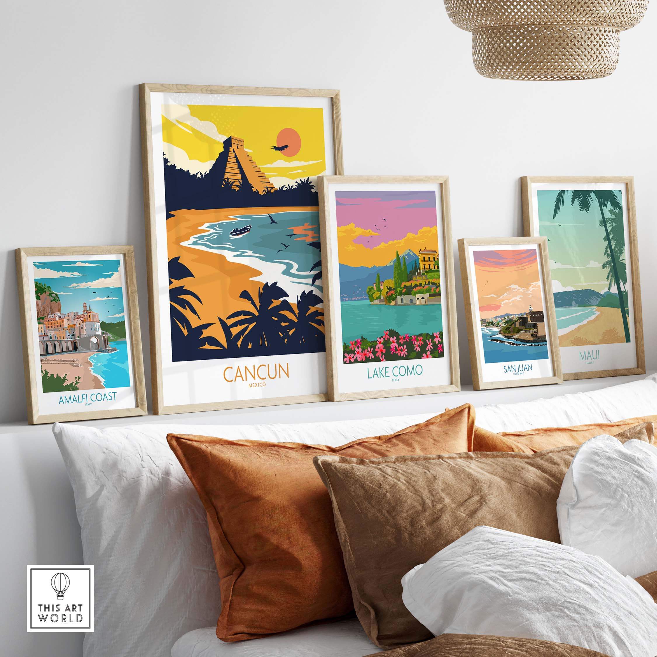 Colorful Cancun travel poster print displayed alongside other vintage travel art in a stylish home setting.