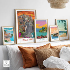 Cinque Terre print showcased with other travel art prints in a stylish home setting, featuring vibrant colors and vintage design.