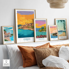 Elegant travel posters featuring Corsica, Lake Como, Amalfi Coast, San Juan, and Maui, styled against a cozy interior decor.