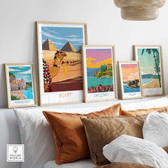 Colorful Egypt poster art print displayed with other vintage travel posters in a stylish interior setting.