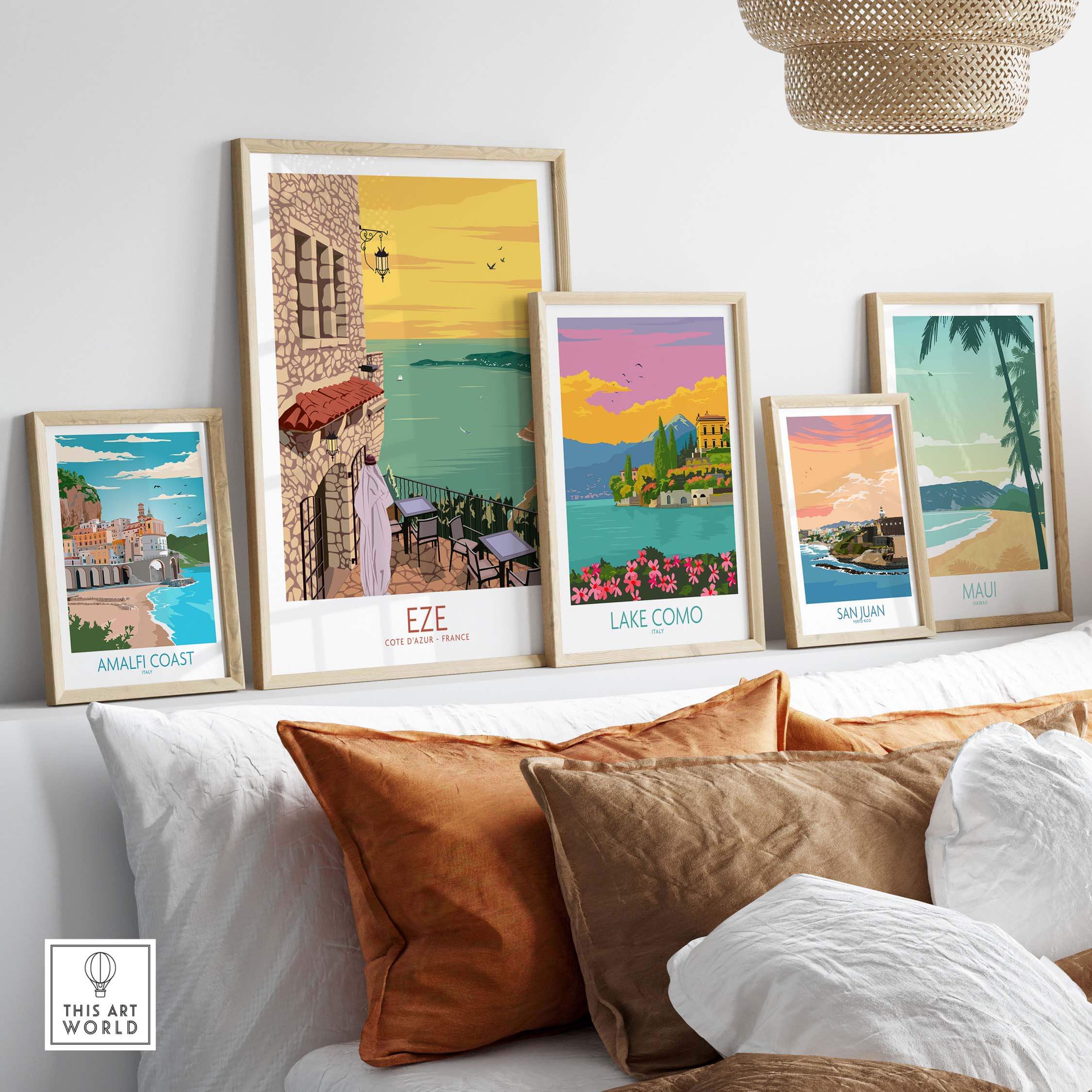 Eze Print France Travel Poster collection displayed in stylish frames on a cozy sofa setting.