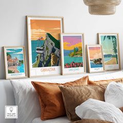 Gibraltar travel poster art print displayed with vintage-style artwork including Amalfi Coast and Lake Como.