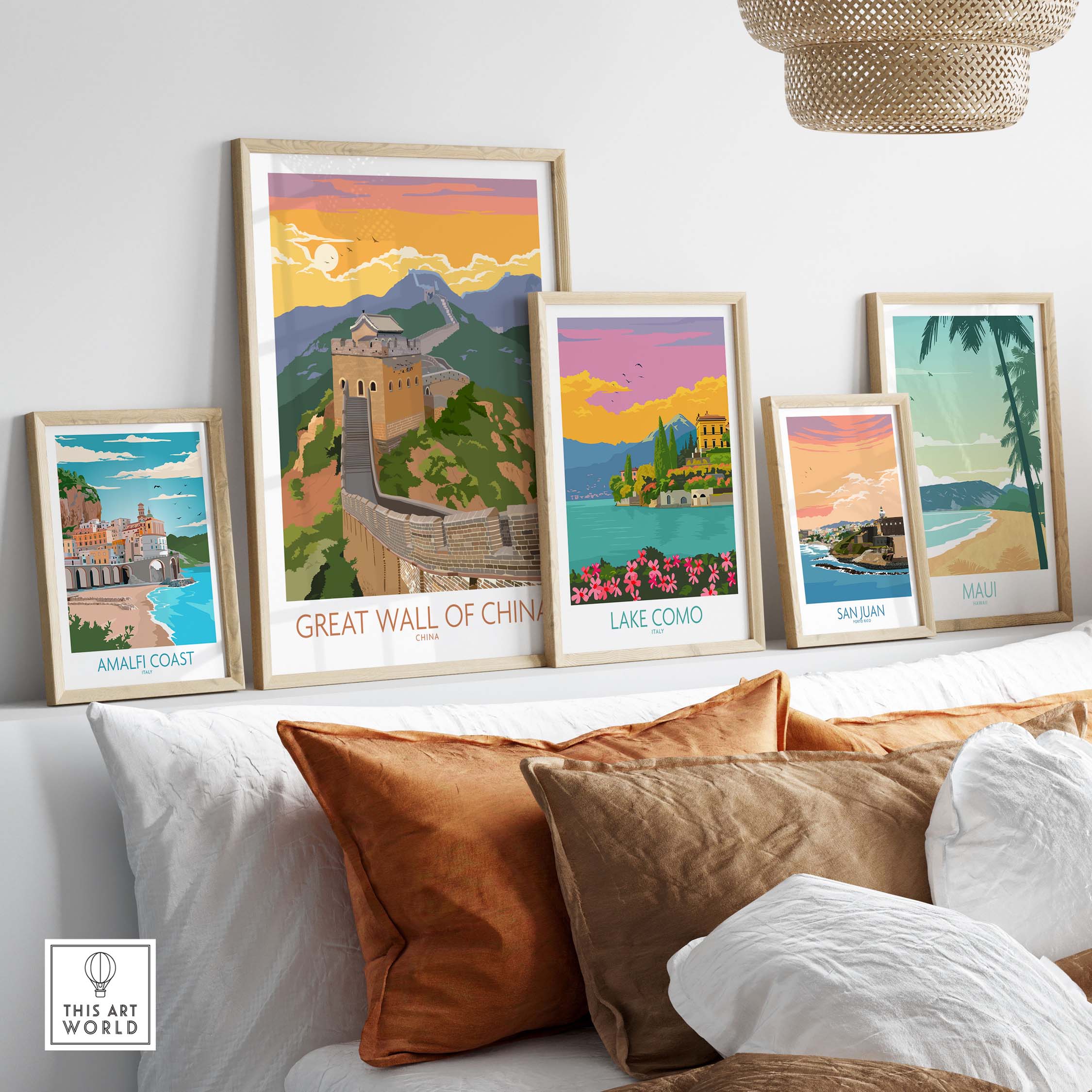 Framed Great Wall of China print with vintage travel posters on display in a stylish living room.