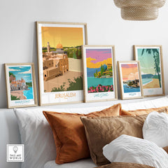 Collection of vintage travel posters featuring Jerusalem, Lake Como, Amalfi Coast, San Juan, and Maui in stylish frames.