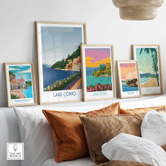 Sleek Lake Como wall art prints displayed elegantly above cozy pillows, showcasing vintage travel poster designs.
