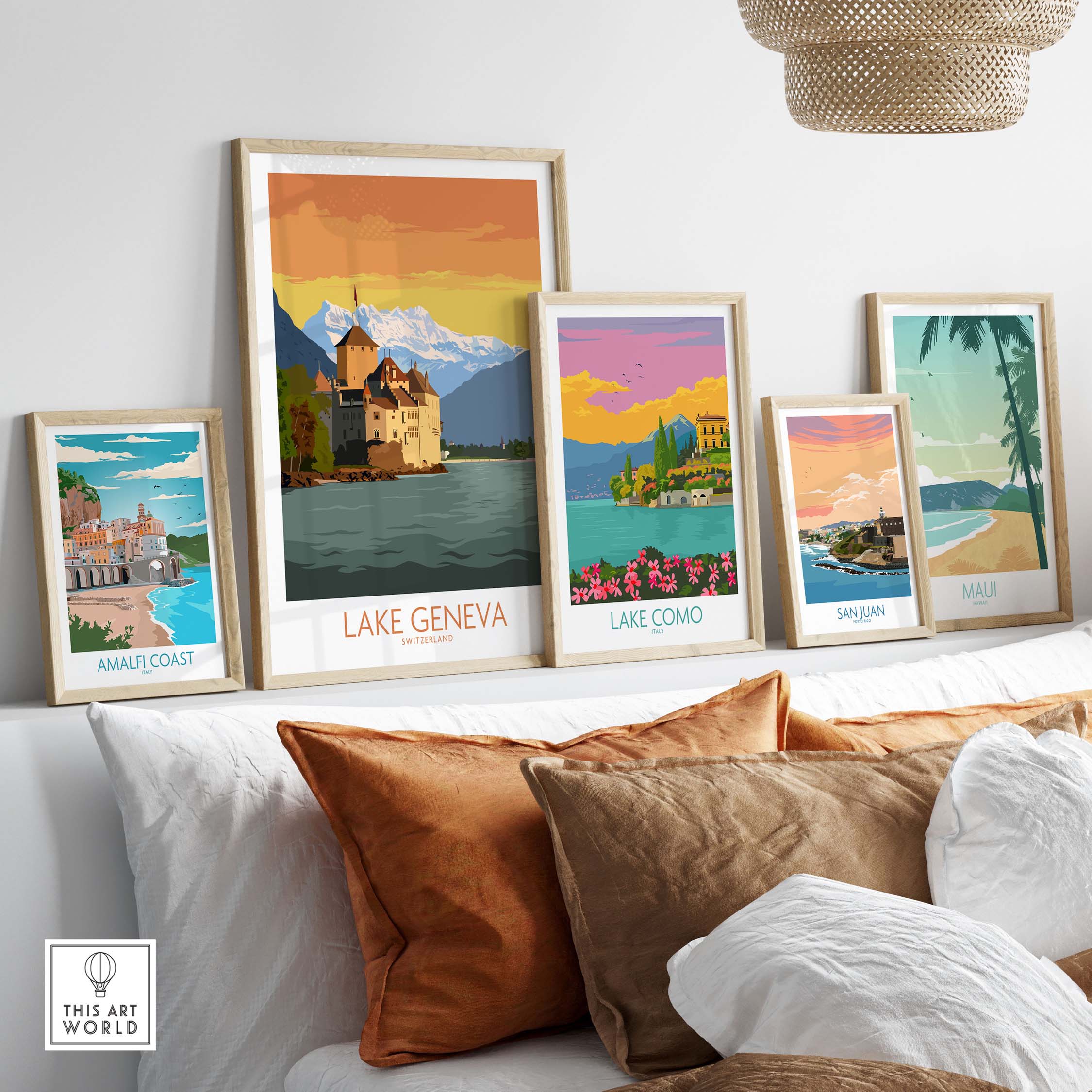 Framed art prints featuring Lake Geneva, Amalfi Coast, and Lake Como, styled in a modern living room setting.