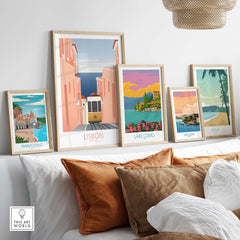 Lisbon Wall Art Poster Print featuring vibrant vintage travel designs with framed prints on a stylish shelf.