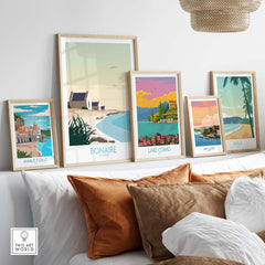 Stylish Bonaire Wall Art Print displayed among vintage travel posters in a modern living room setting.