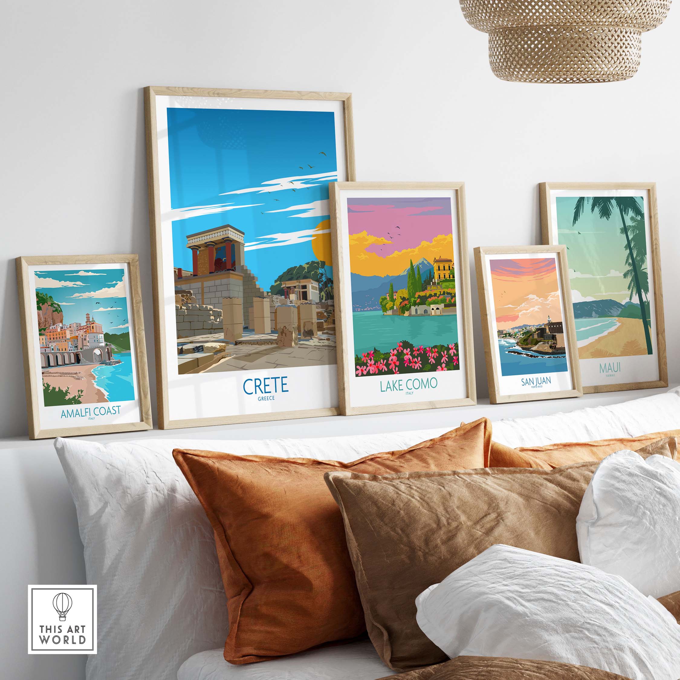Framed Crete wall art prints showcasing vintage Greece travel posters on a stylish shelf with decorative cushions.