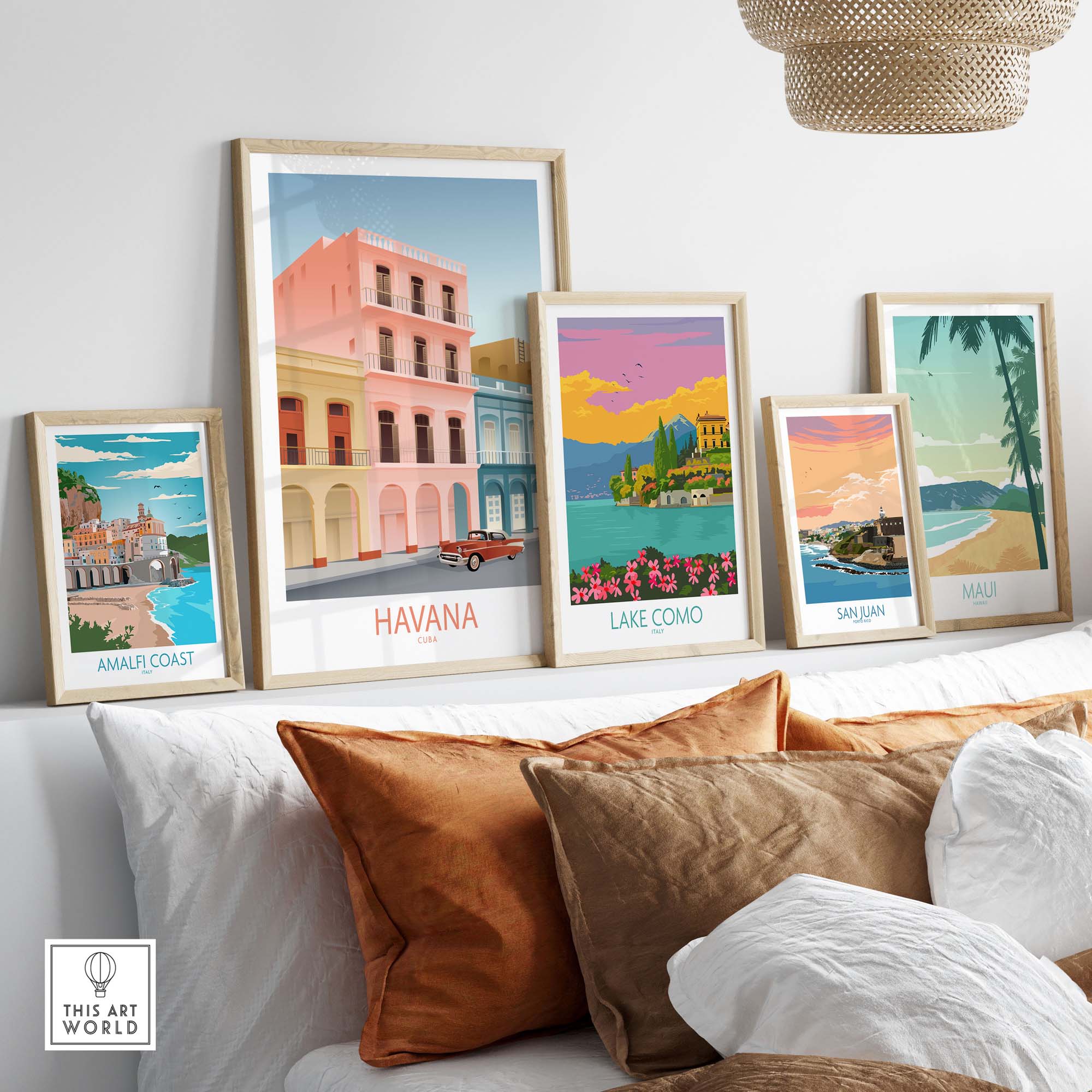 Framed art prints featuring Havana, Lake Como, and Amalfi Coast on a stylish home decor display.