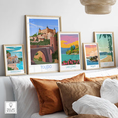 Toledo wall art print and travel posters displayed on a stylish shelf, featuring beautiful landscapes and minimalist designs.