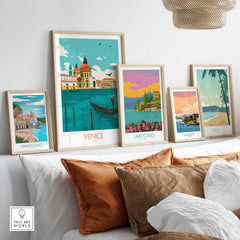 Vintage-inspired Venice Italy poster print collection displayed in a stylish living room setting with decorative pillows.