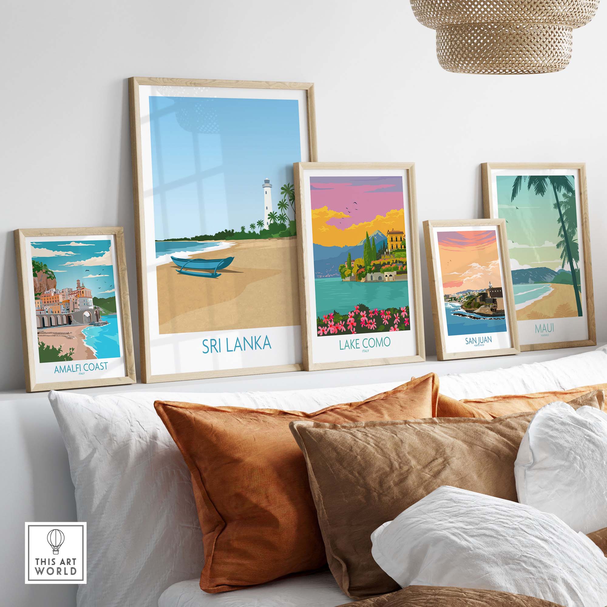 Sri Lanka wall art print featuring beach and landscape in a stylish, minimalist frame display on a sofa.