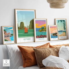Collection of vintage travel posters featuring Vietnam, Lake Como, Amalfi Coast, San Juan, and Maui art prints displayed stylishly.