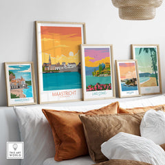 Maastricht travel poster alongside other vintage travel posters in a stylish home setting.