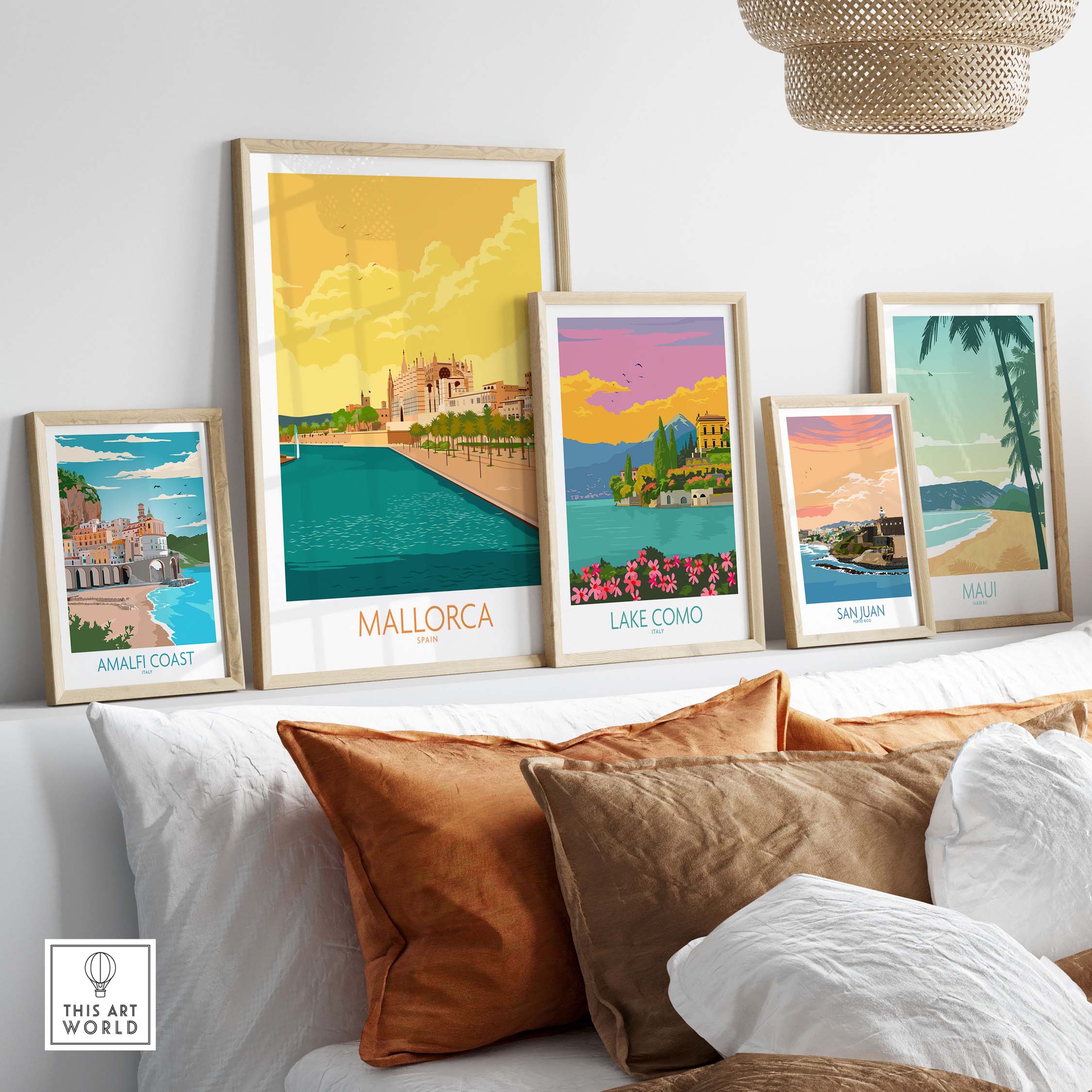Framed Mallorca poster alongside other vintage travel art prints in a stylish living room setting.