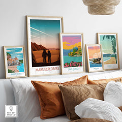 Framed Mars Explorers poster and vintage travel art on a stylish wall, showcasing wanderlust decor.