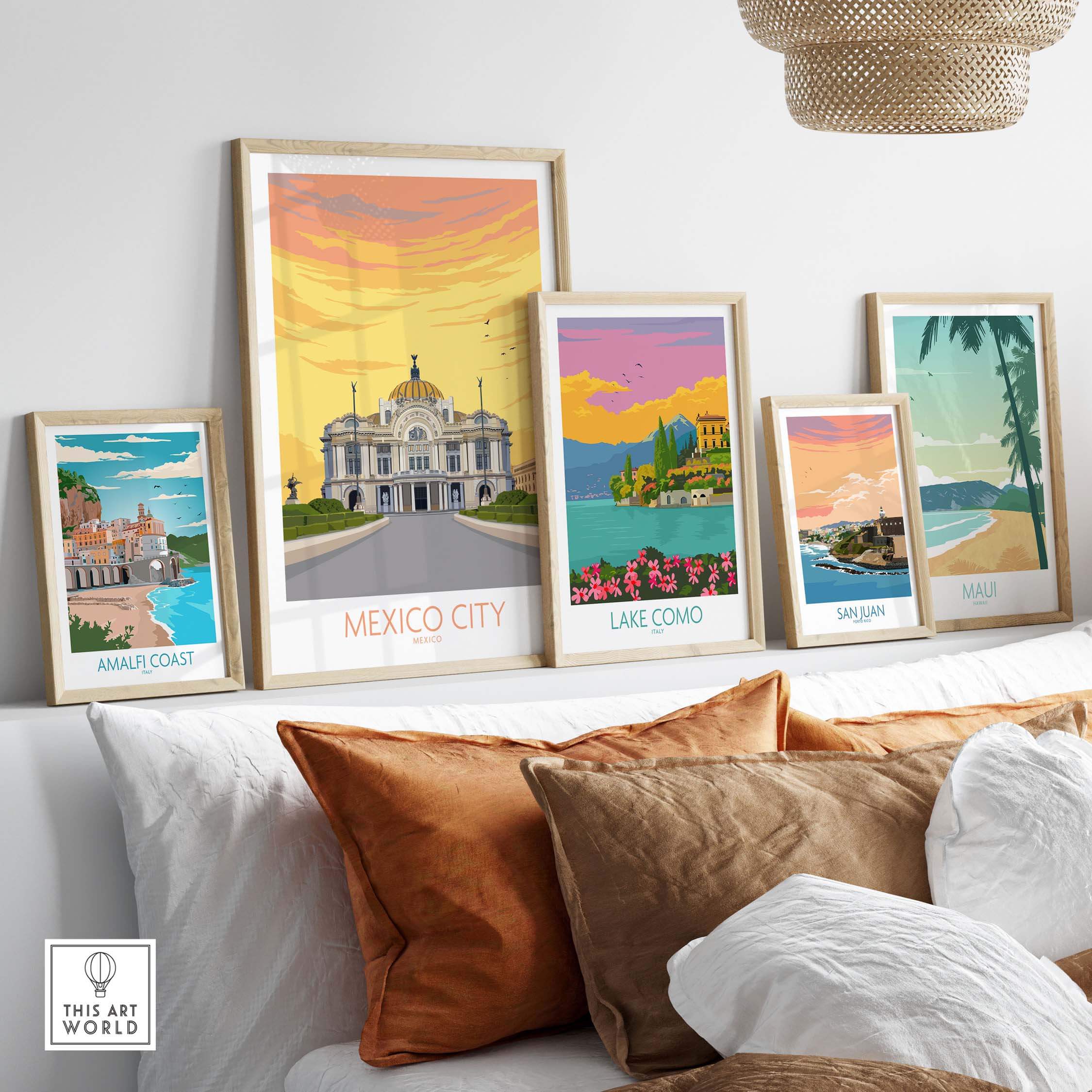 Stylish framed vintage travel posters including Mexico City, Lake Como, and Amalfi Coast, arranged decoratively on a shelf.