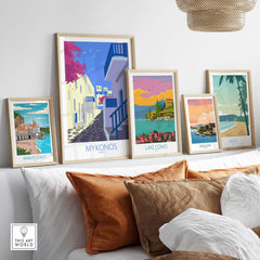 Framed Mykonos travel poster in a stylish living room display with other travel art prints.