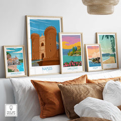 Collection of vintage travel posters featuring Naples and scenic Italian locations, styled elegantly in a cozy setting.