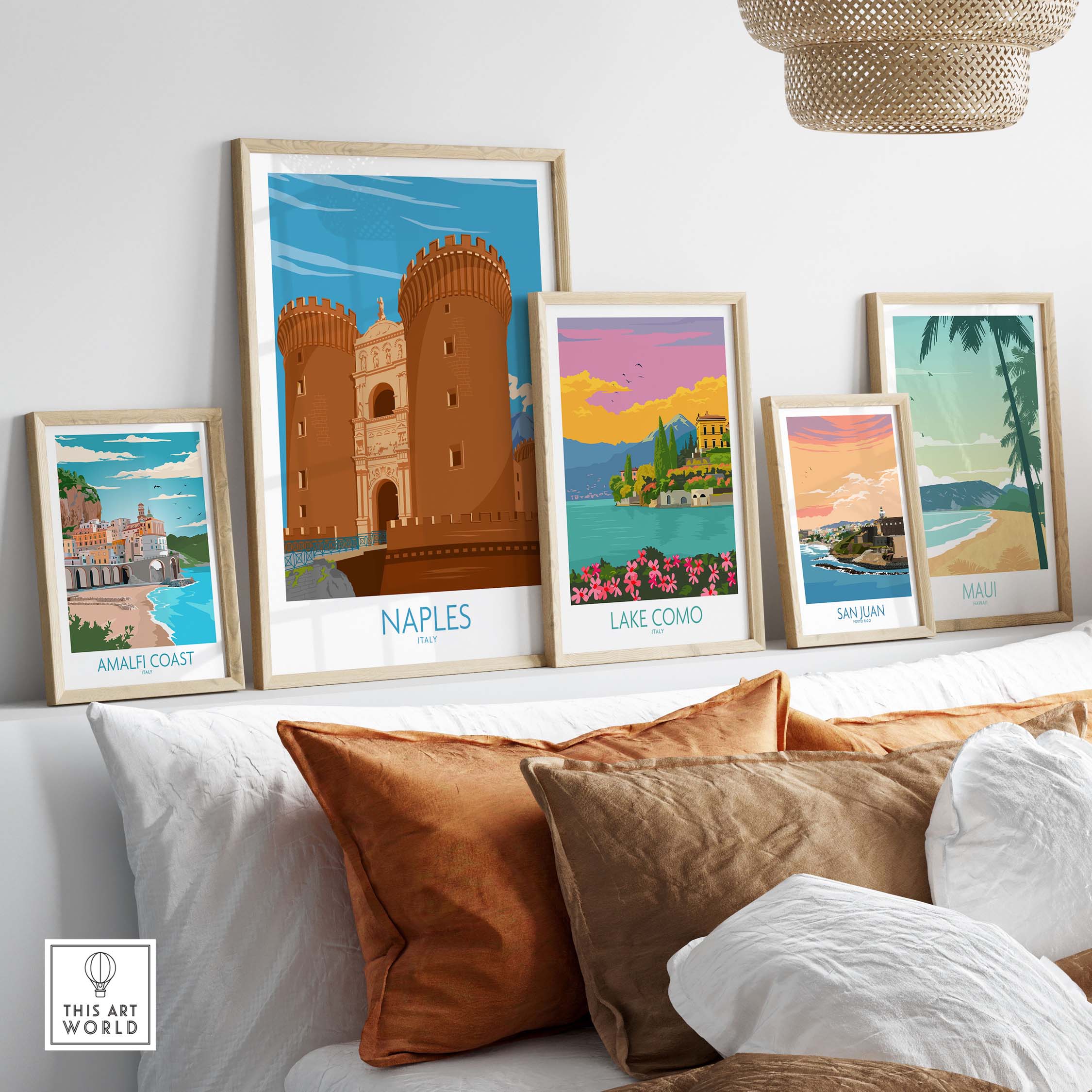 Collection of vintage travel posters featuring Naples and scenic Italian locations, styled elegantly in a cozy setting.