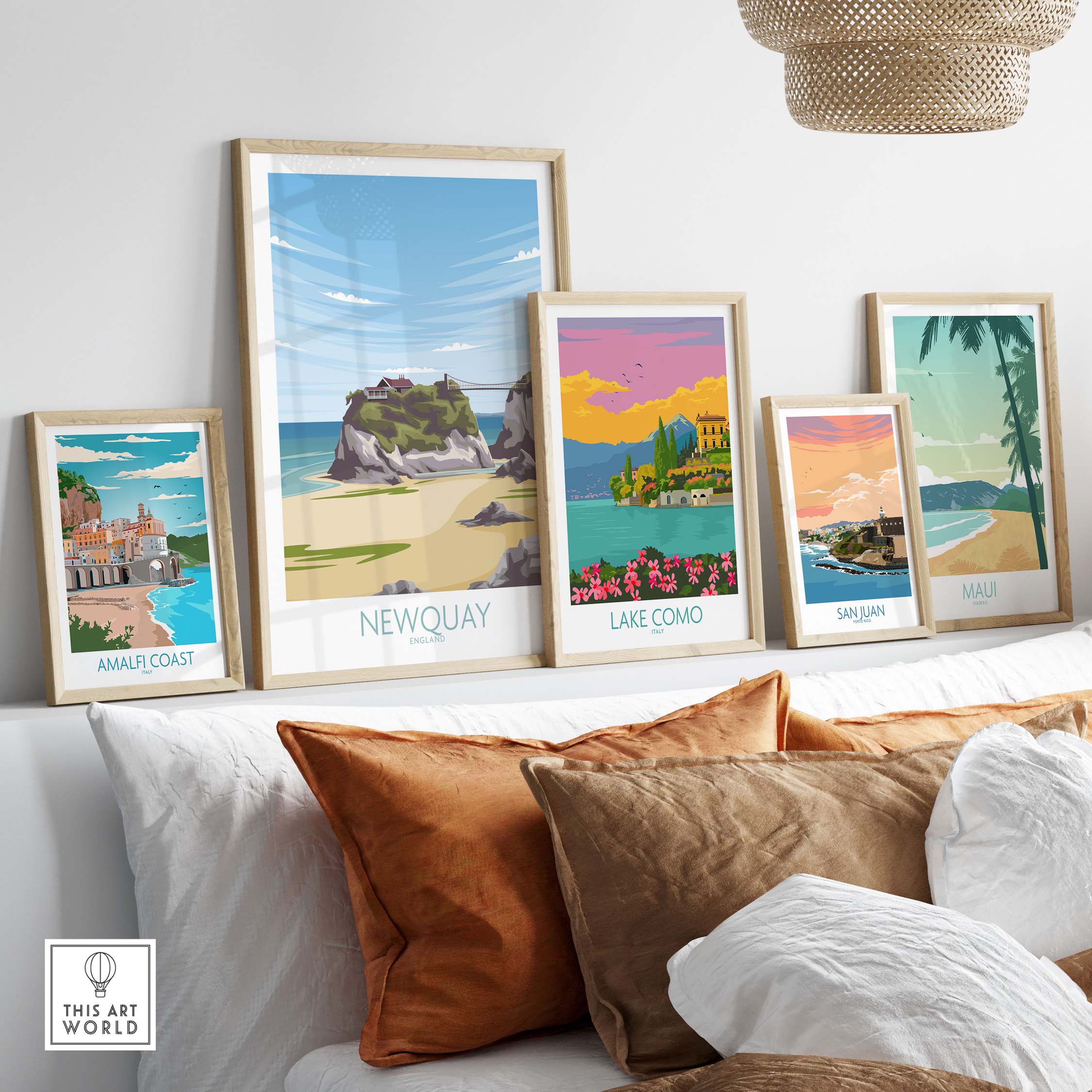 Stylish Newquay Cornwall travel poster among vintage artwork on a cozy wall, showcasing wanderlust and travel inspiration.