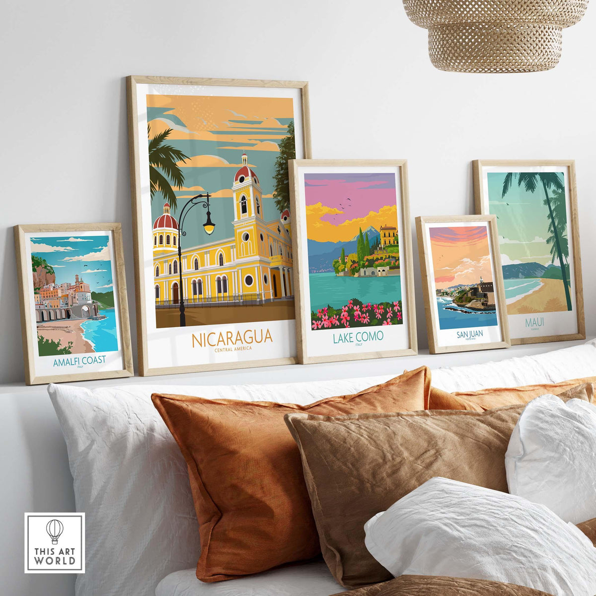 Stylish Nicaragua and travel posters displayed on a shelf, showcasing vibrant travel art for home decor.