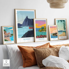 Beautiful collection of Nordic travel posters, including Norway, showcased above decorative pillows.