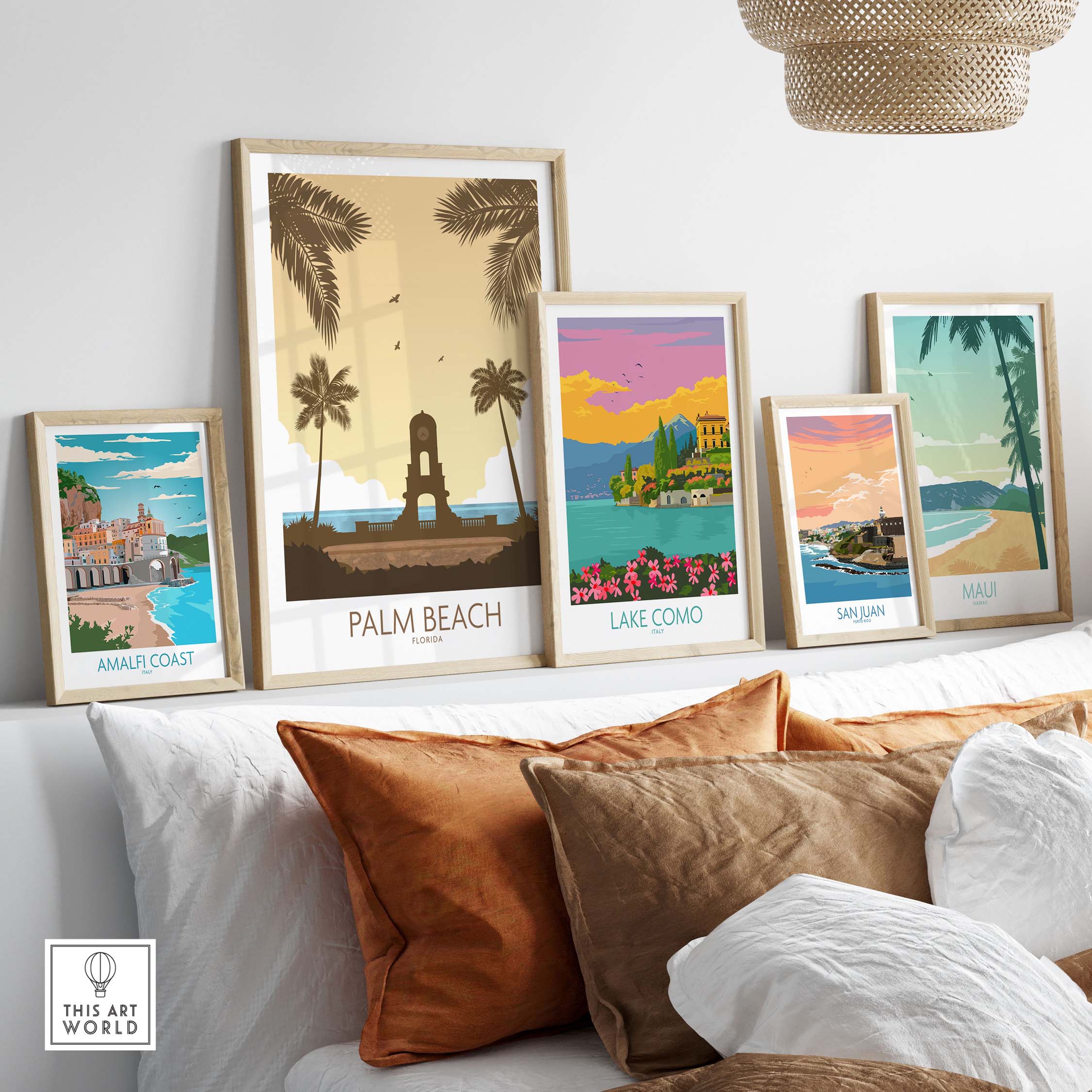 Framed Palm Beach Wall Art and vintage travel posters on display, showcasing coastal destinations like Lake Como and Amalfi Coast.