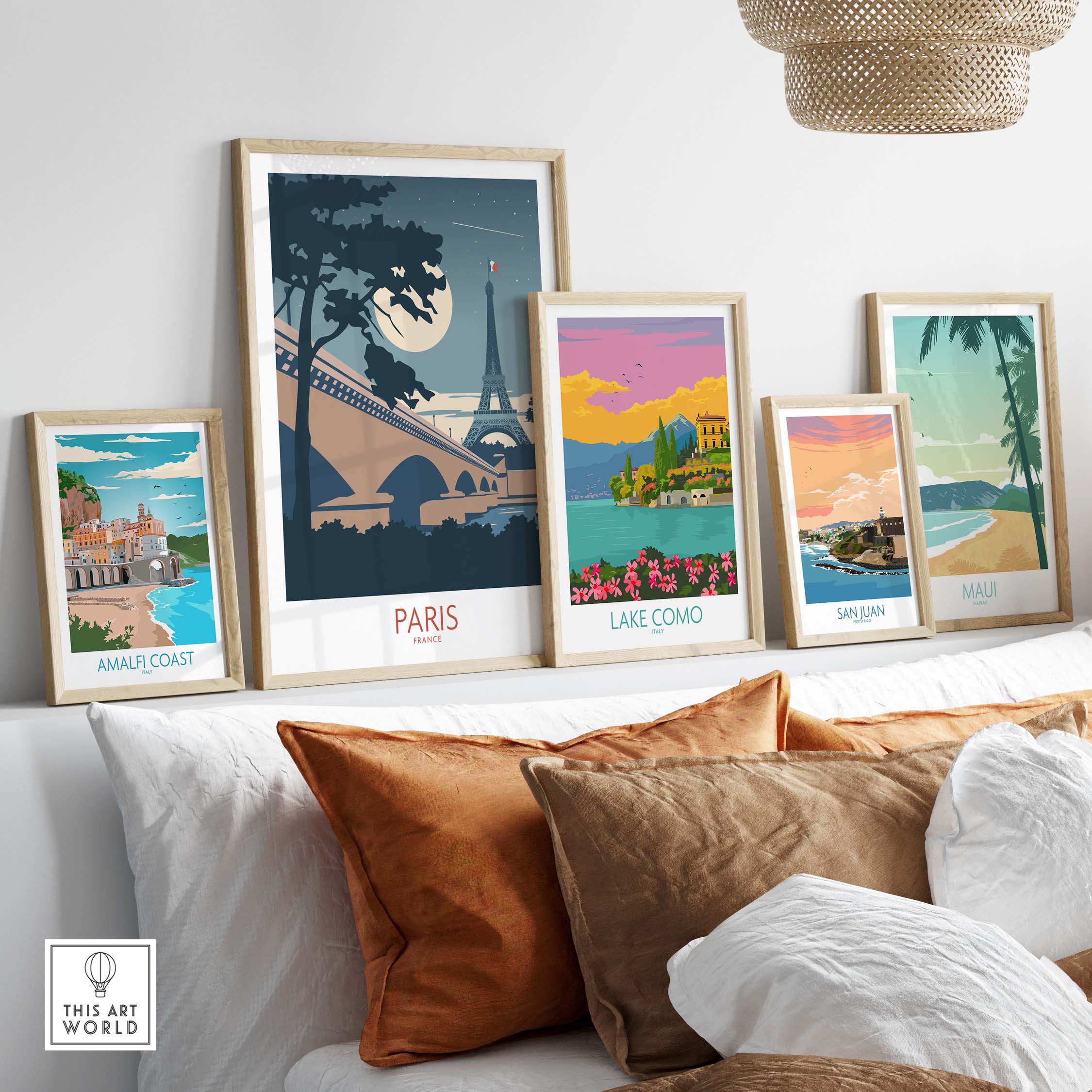 Paris France travel poster among stylish framed art prints of scenic destinations for home decor inspiration.