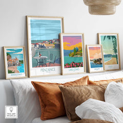 Penzance Poster Cornwall Print alongside other travel prints like Amalfi Coast and Lake Como on a stylish living room wall.