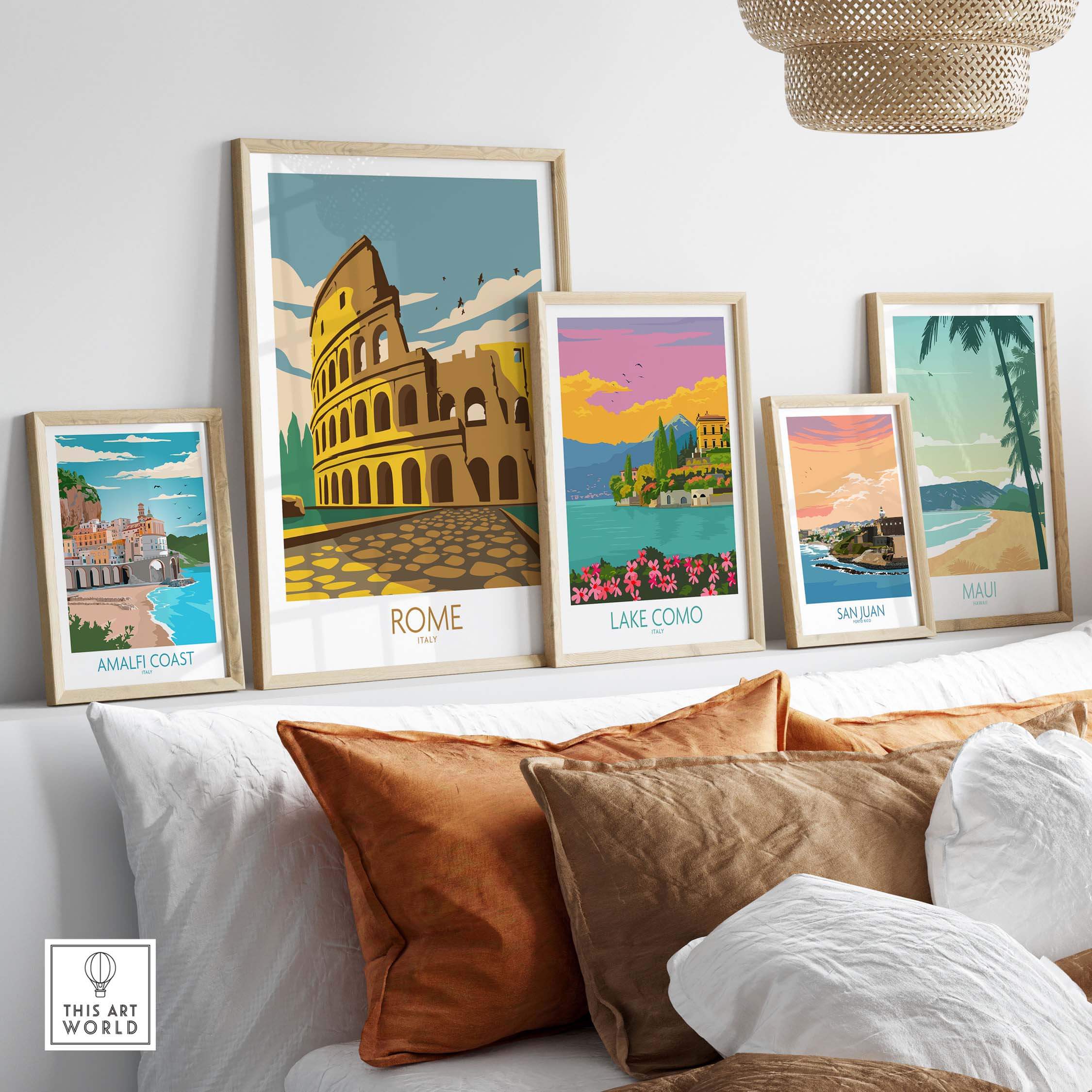 Vintage Rome travel poster collection displayed above a cozy couch, showcasing the Colosseum and scenic Italian landscapes.