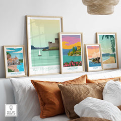 Scottish Highlands art print displayed with other travel posters, enhancing home decor aesthetic with vintage style.