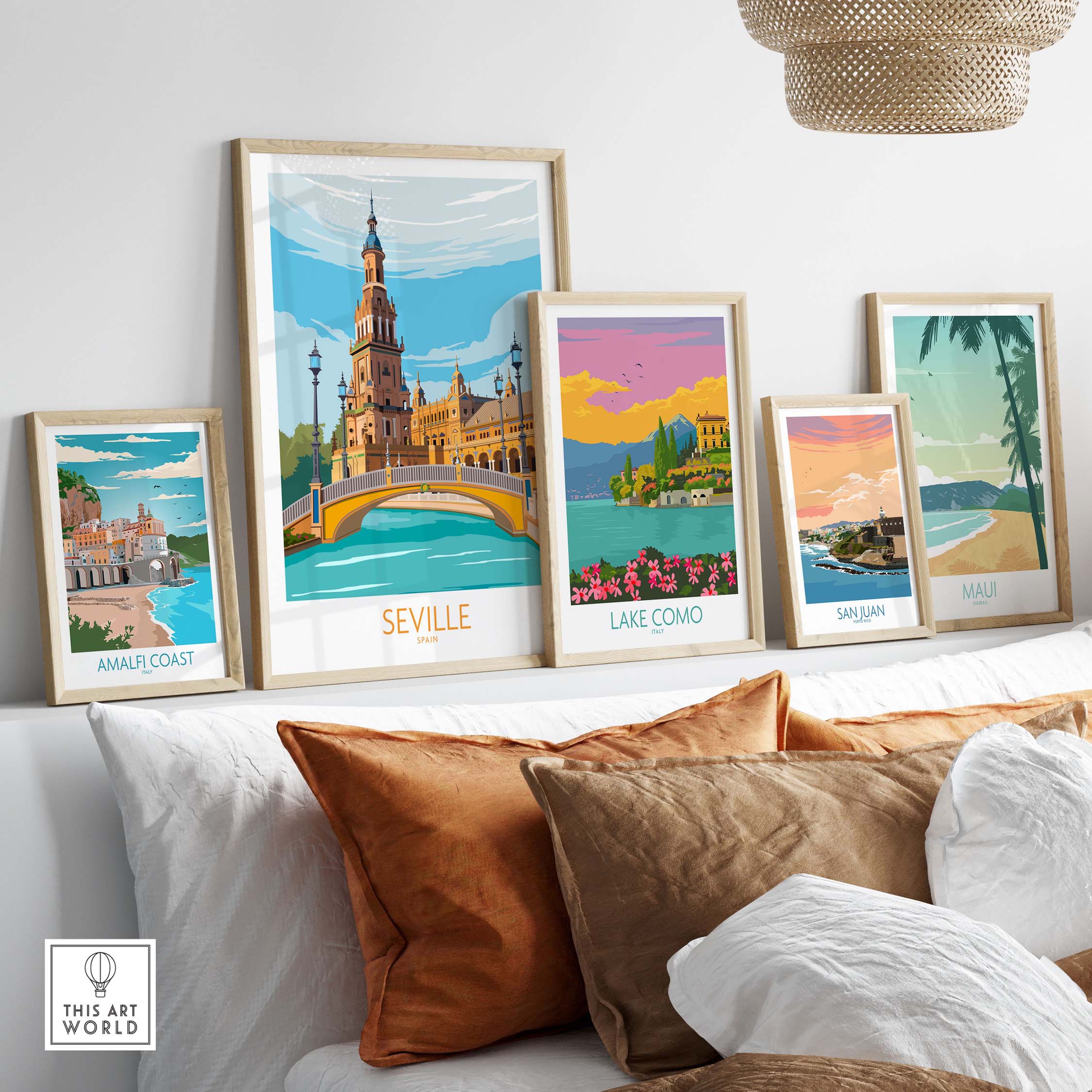 Seville travel art print displayed among other vintage travel posters on a stylish home decor setup.