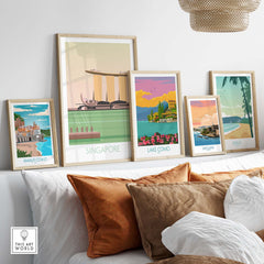 Stylish Singapore Print Travel Poster collection displayed on a wall, featuring vintage travel designs and vibrant colors.