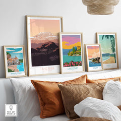 Stylish Kilimanjaro Print Tanzania poster displayed among vintage travel art prints on a sofa.