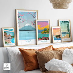 Stylish travel posters featuring Tokyo and various landscapes displayed in a cozy living room setting.