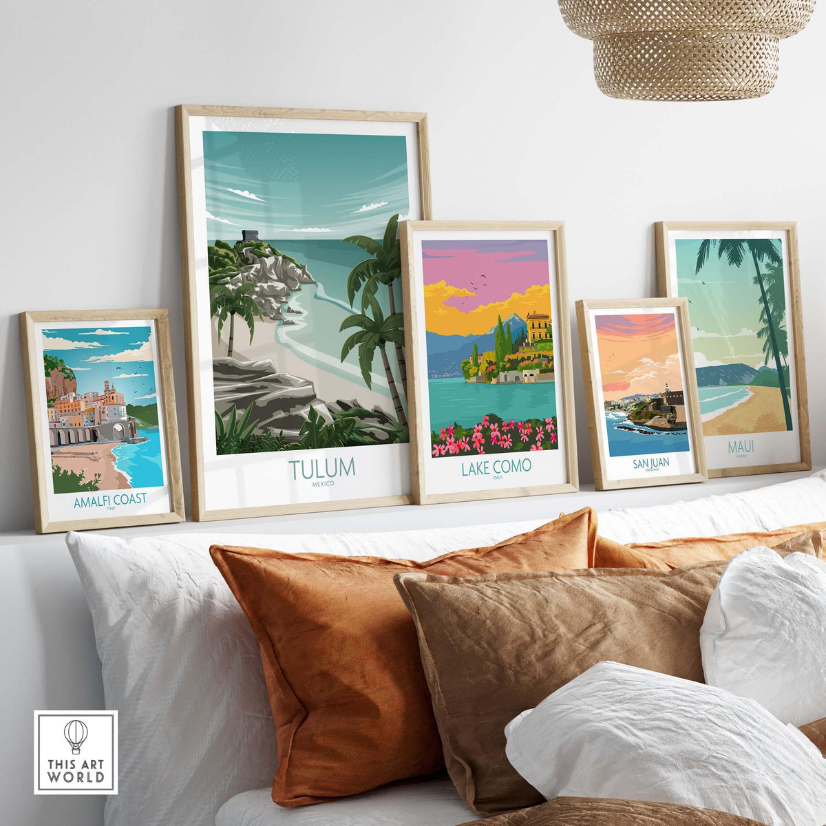 Tulum Art Print Mexico travel poster displayed among vintage-style travel art prints on a stylish sofa.