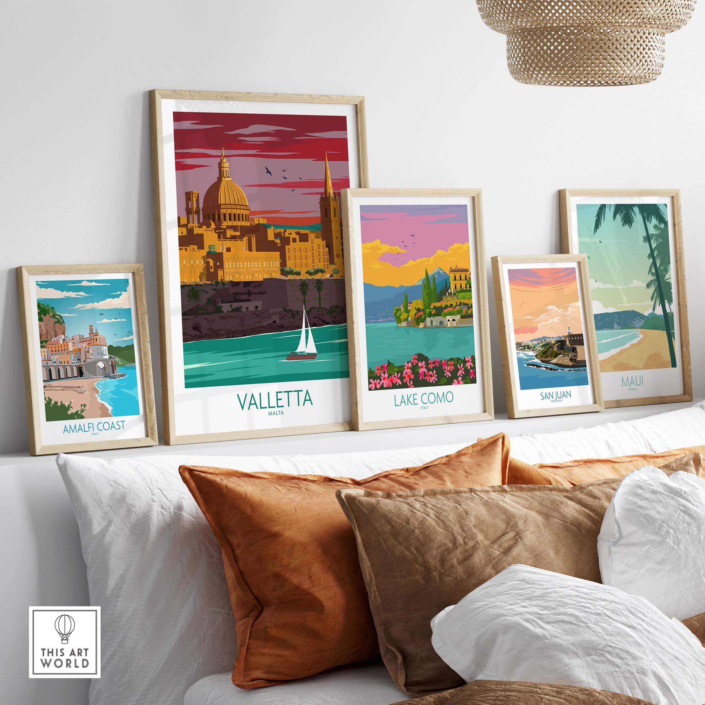 Valletta Print Malta Poster and other vintage travel art prints displayed on a stylish sofa.