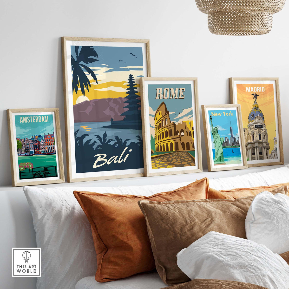 Bali Poster Wall Art Print displayed among vintage city posters on a stylish sofa with cushions.