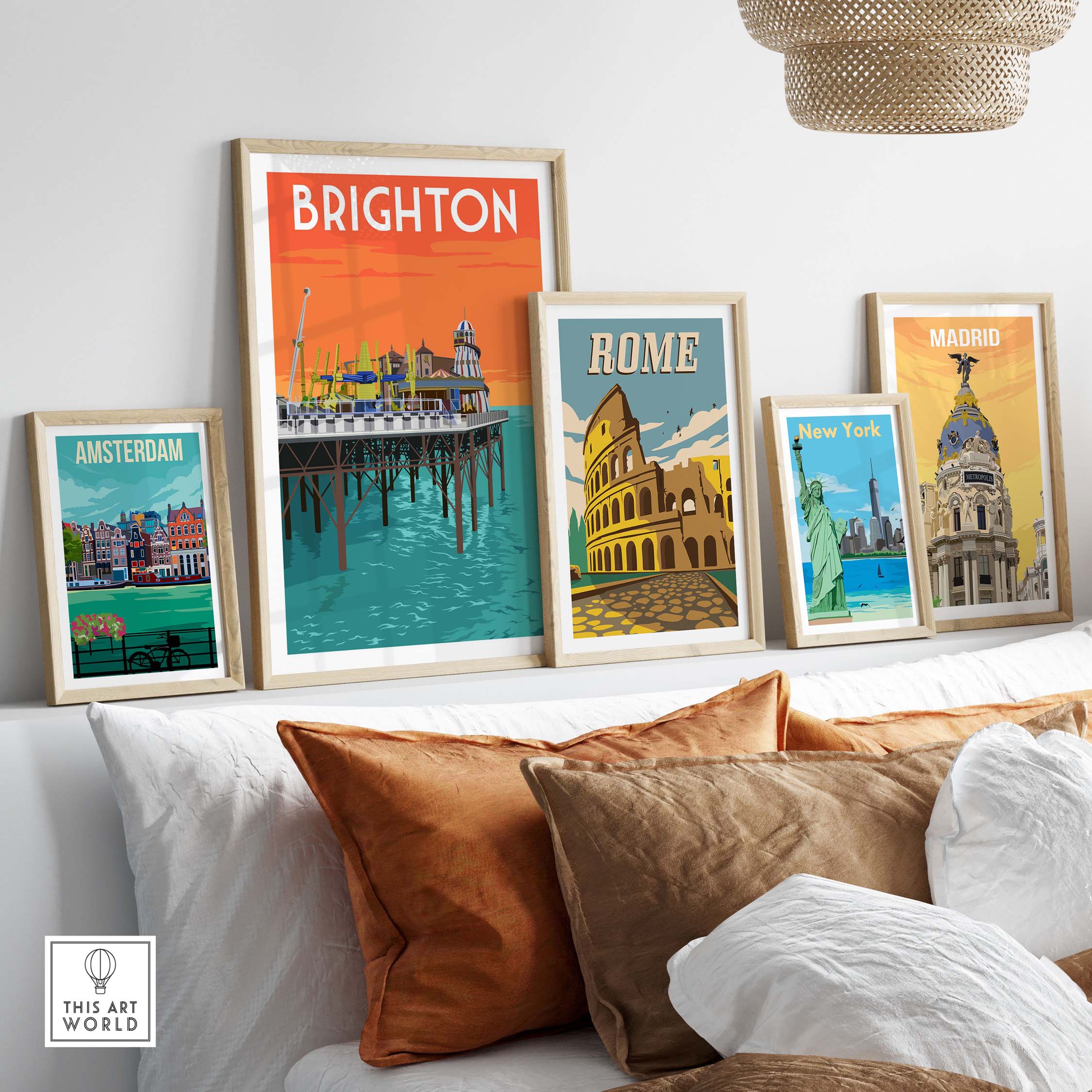 Brighton vintage travel poster wall art in stylish frames on a shelf with Amsterdam, Rome, New York, and Madrid prints.