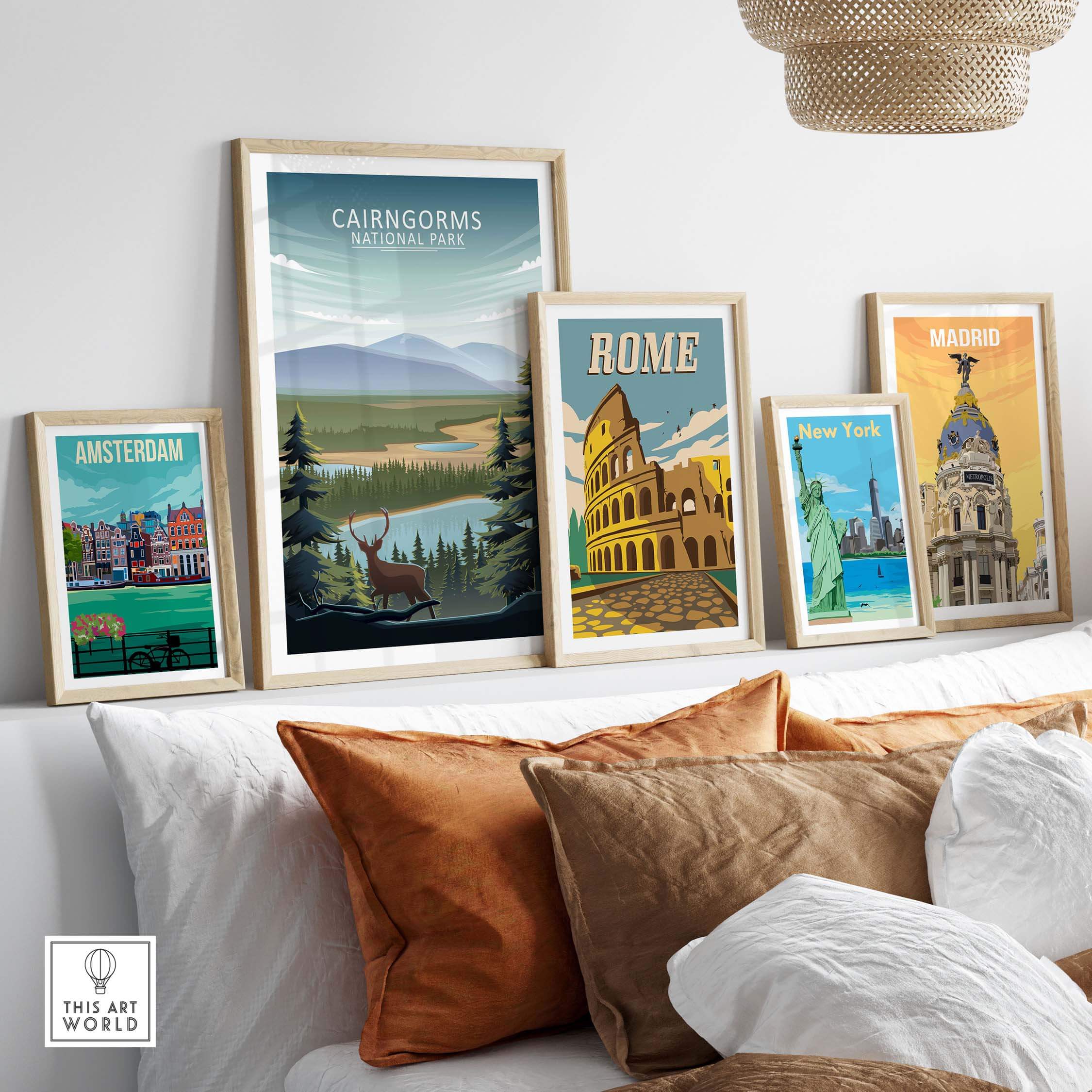 Cairngorms National Park poster among other city prints on a stylish wall above a comfortable couch.