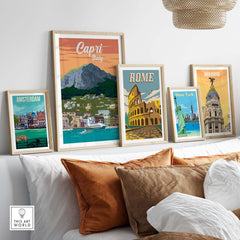 Framed Capri Italy poster print among vintage travel art prints in stylish home decor setting.